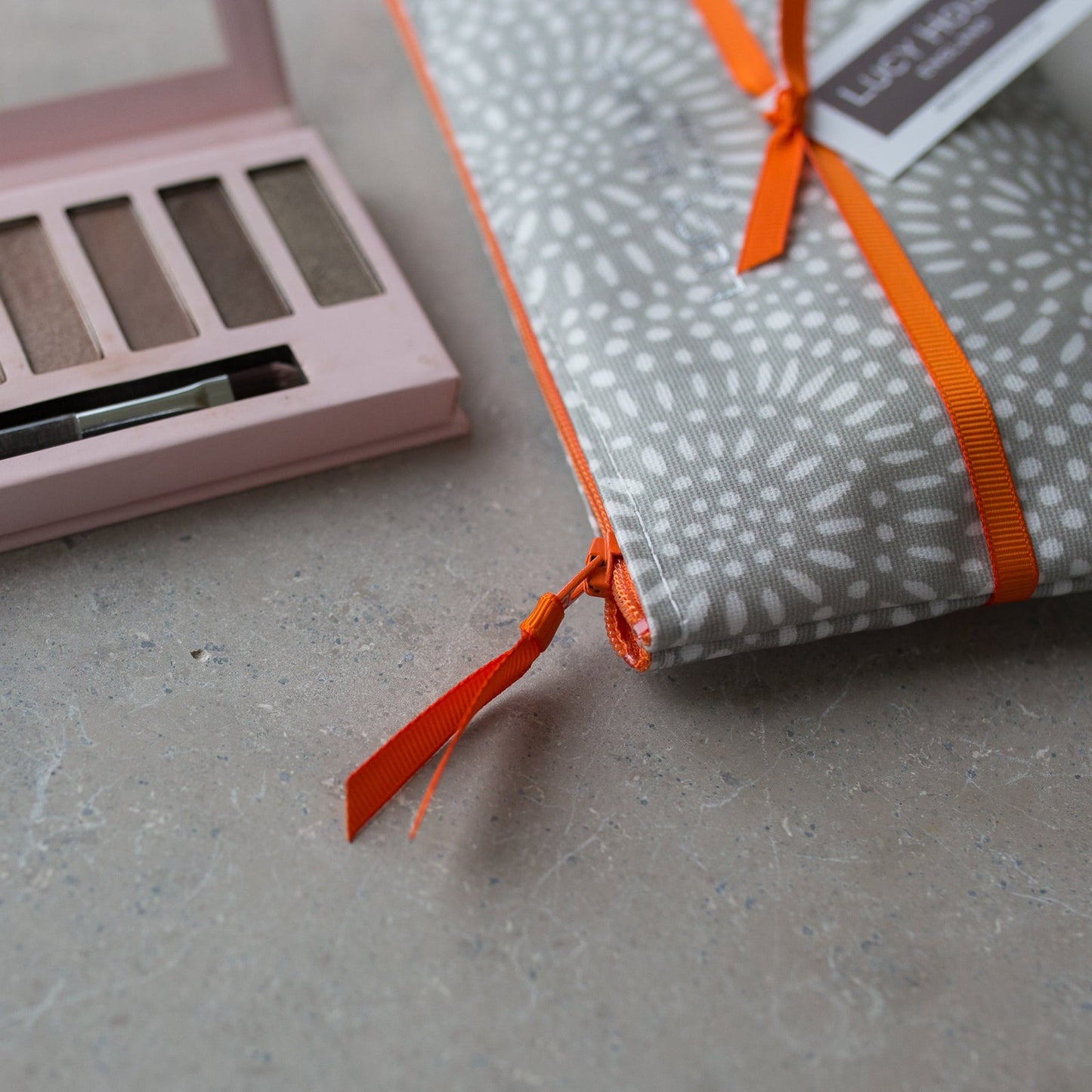 Stone Sunburst  Make-Up Bag with Orange Zip