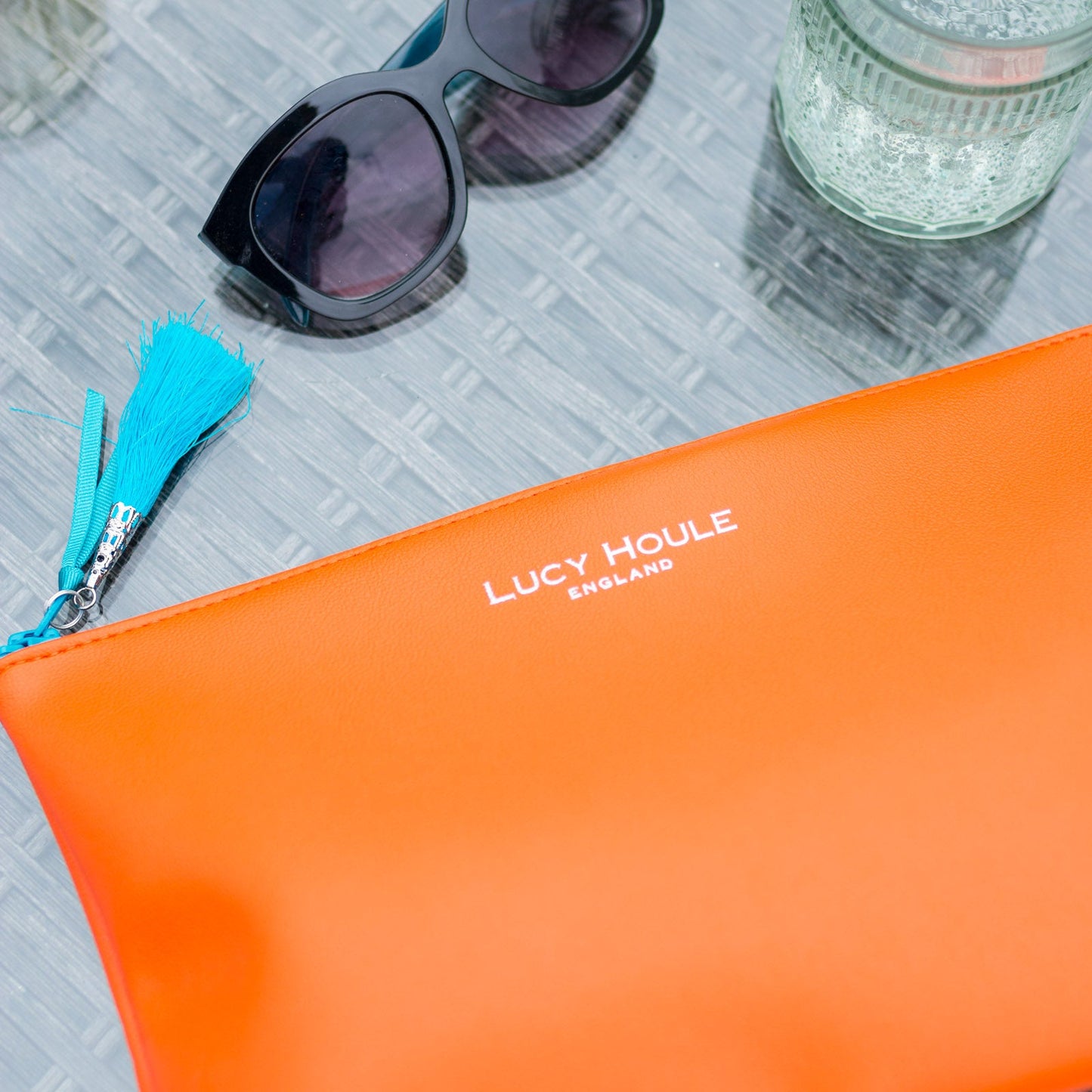 Faux Leather Orange Clutch with Turquoise zip
